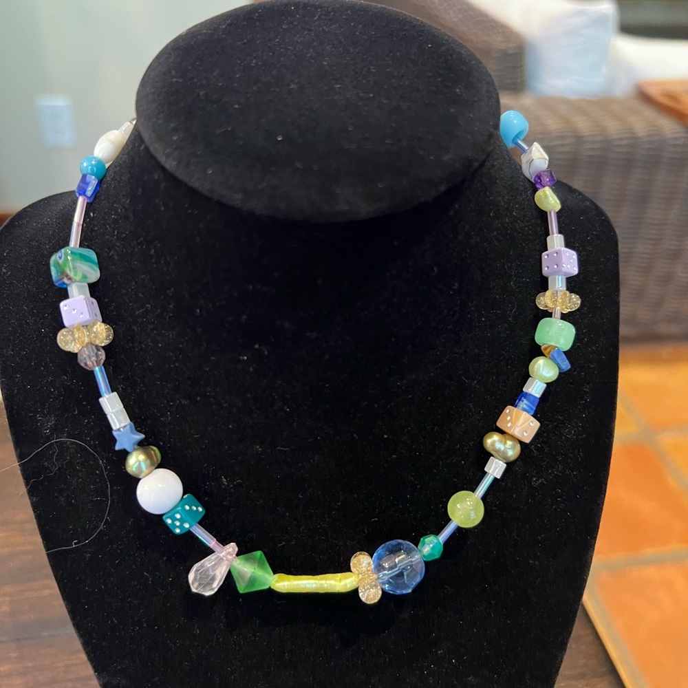 Different necklaces, each $25.  Will discount if you take multiple